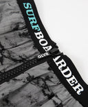 Комплект от удължена шушлякова и кратка трикотажна пола Gulliver