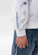 Бял суитшърт с асиметричен флорален десен от Gulliver