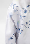 Бял суитшърт с асиметричен флорален десен от Gulliver