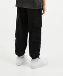 Pantaloni tip jogger din bumbac cu buzunare cargo pentru băiat, negri, Gulliver.