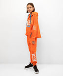 Панталон от трикотаж оранжев за МОМИЧЕ основен изглед